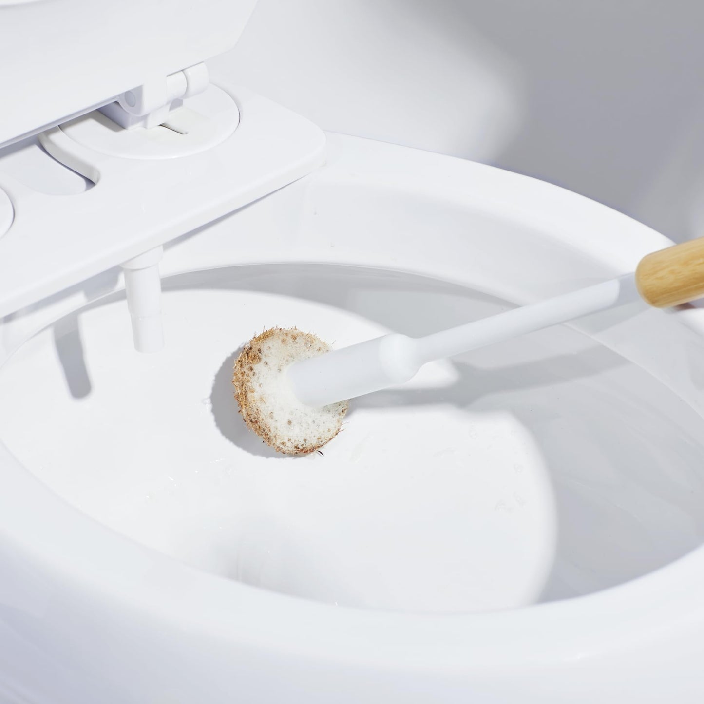 TUSHY Toilet Brush 2.0 Set: with Cleanser-Infused Pads and Holder (Disposable Planet Friendly Refills), Includes 8 Lemon and Tea Tree Coconut Husk Scrubbing Pads