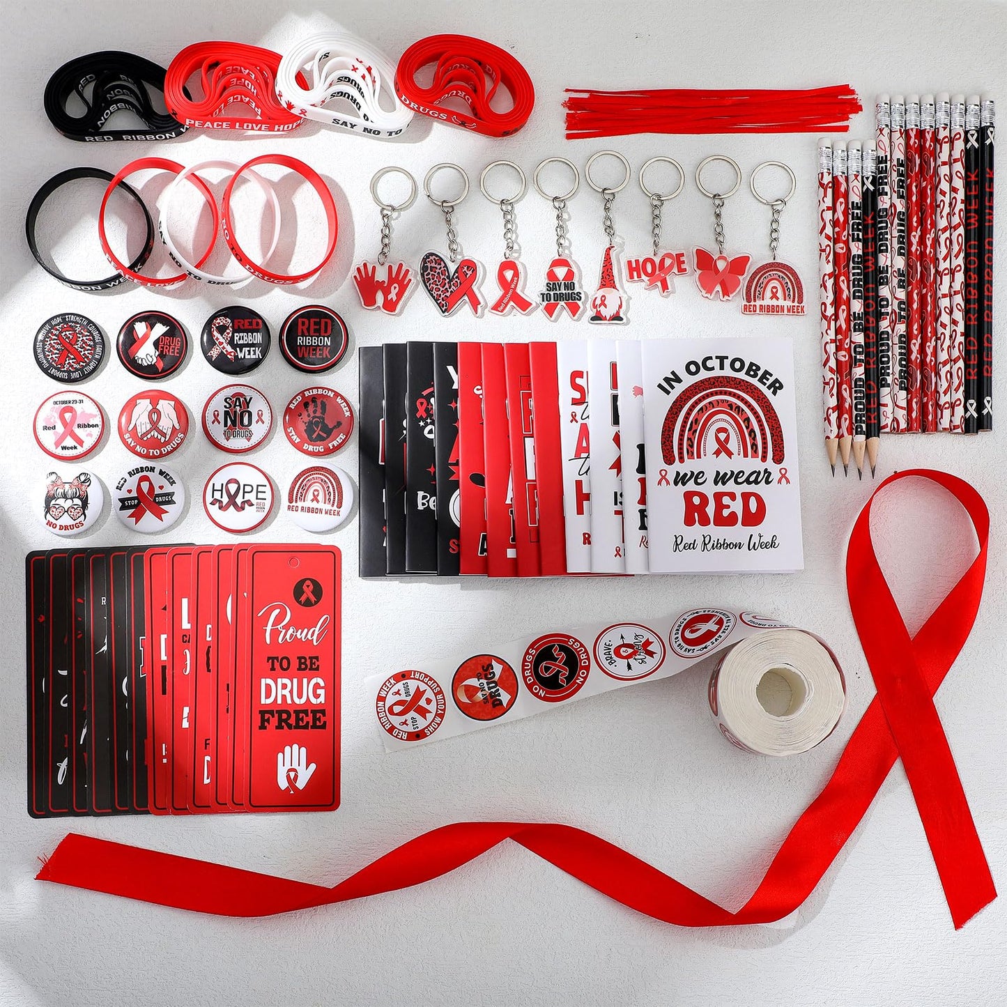 24 Sets Red Ribbon Week Supplies Bulk Include Red Ribbon Awareness Pin Notebook Bookmarks Drug Free Keychain Silicone Wristbands Pencils Stickers Tattoos for Student Teenage Say No to Drugs Event Gift
