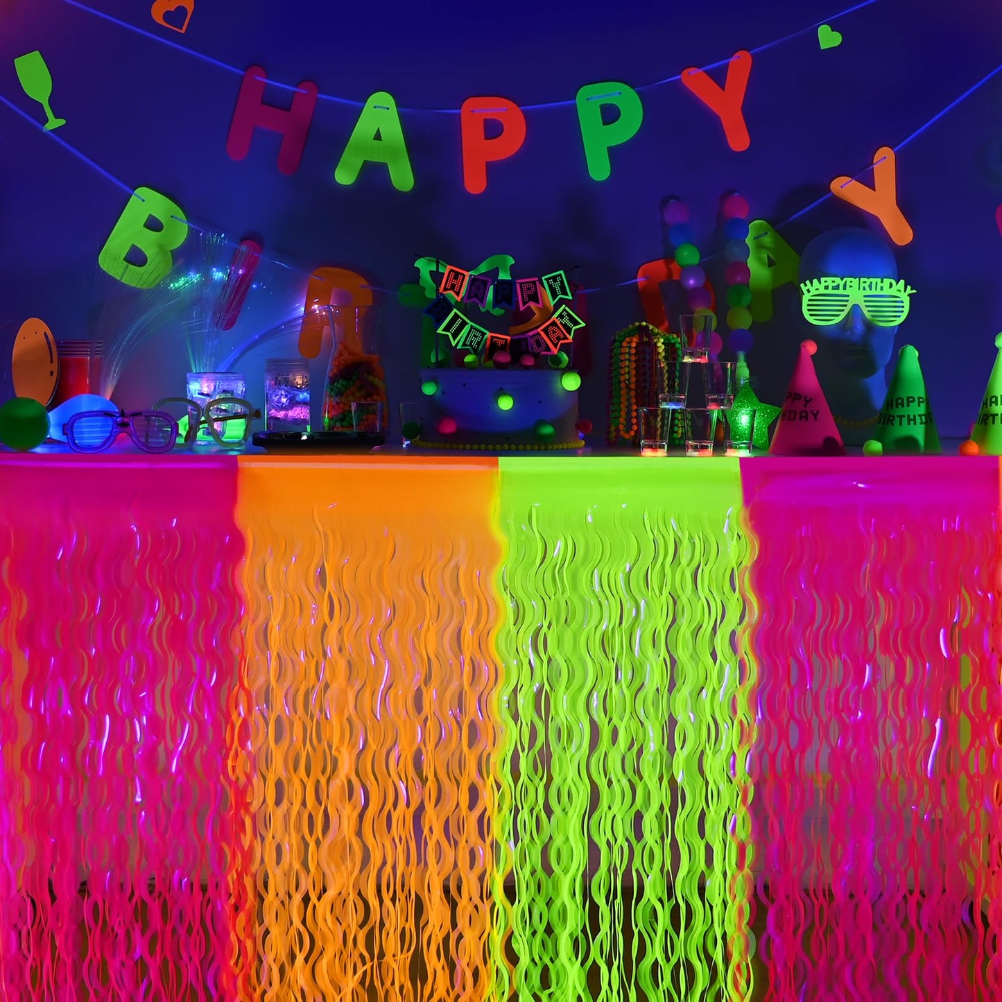 Mega-L Glow in The Dark Party Supplies, 4 Pack Neon Party Decorations Fluorescent Macaron Orange, Yellow and Fuchsia Wavy Metallic Tinsel Foil Fringe Table Skirt, Perfect Glow Birthday Party Decor