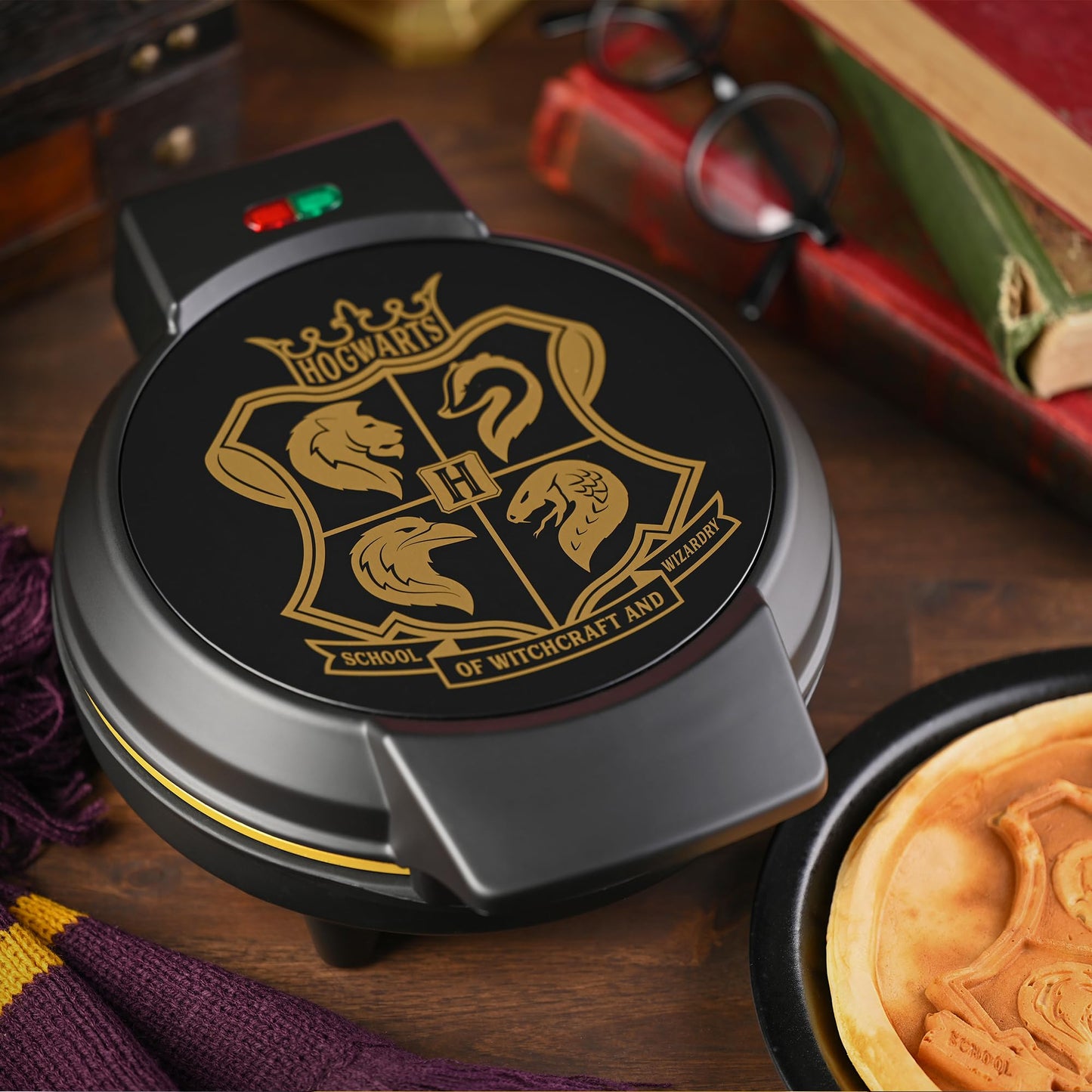 Warner Brothers Harry Potter Round Waffle Maker by Select Brands - Ceramic Coated Cooking Plates - Imprints Hogwarts Crest on Waffles, Black and Gold, WBH-250WM