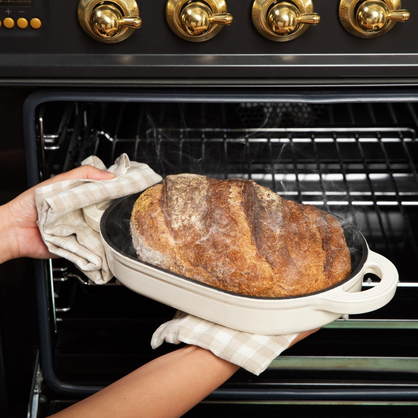 TOMO Cast Iron Oval Bread Oven, 10" x 6.5" - Rustic Dutch Oven Bread Cloche with Steam Circulating Lid for Perfect Sourdough
